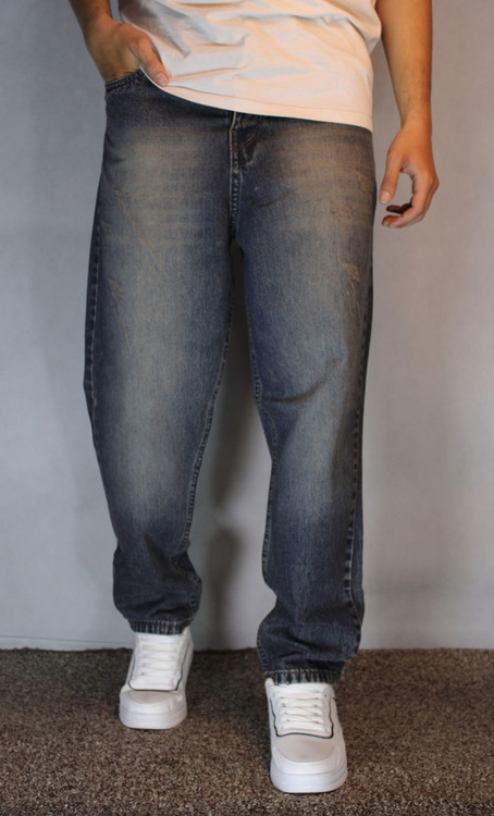 شلوار جین پَر مام فیت مردانه – رنگ آبی کثیف شور (سایز ۴۲ تا ۵۰)